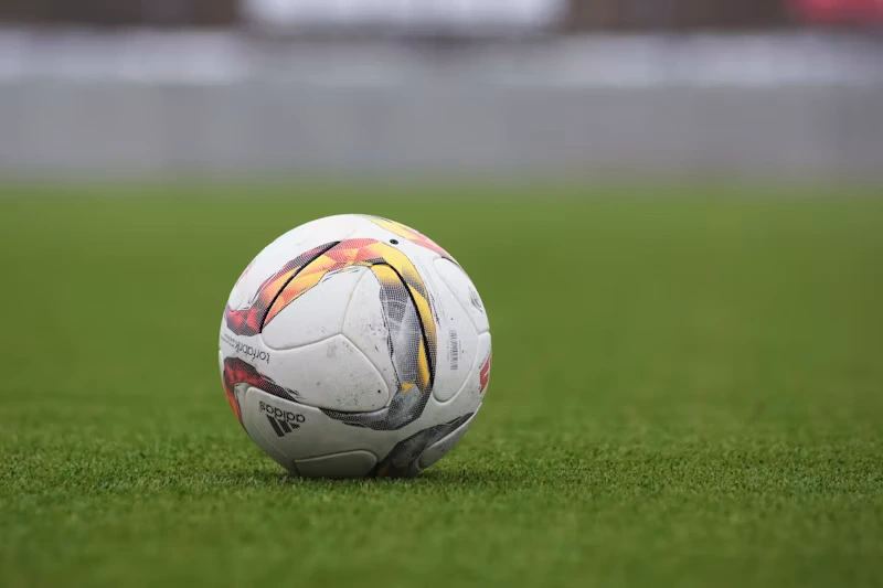 Football player kicking the ball